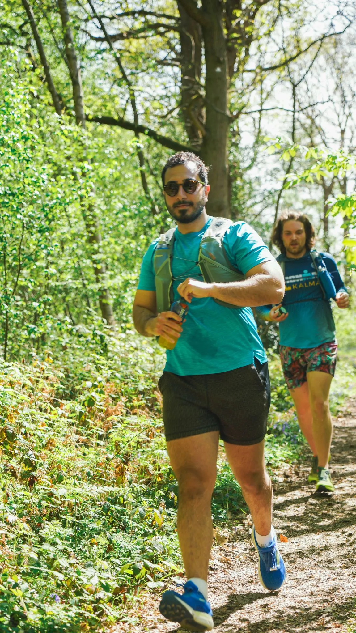 A runner on the bluebell woodland trail at Backyard Egg