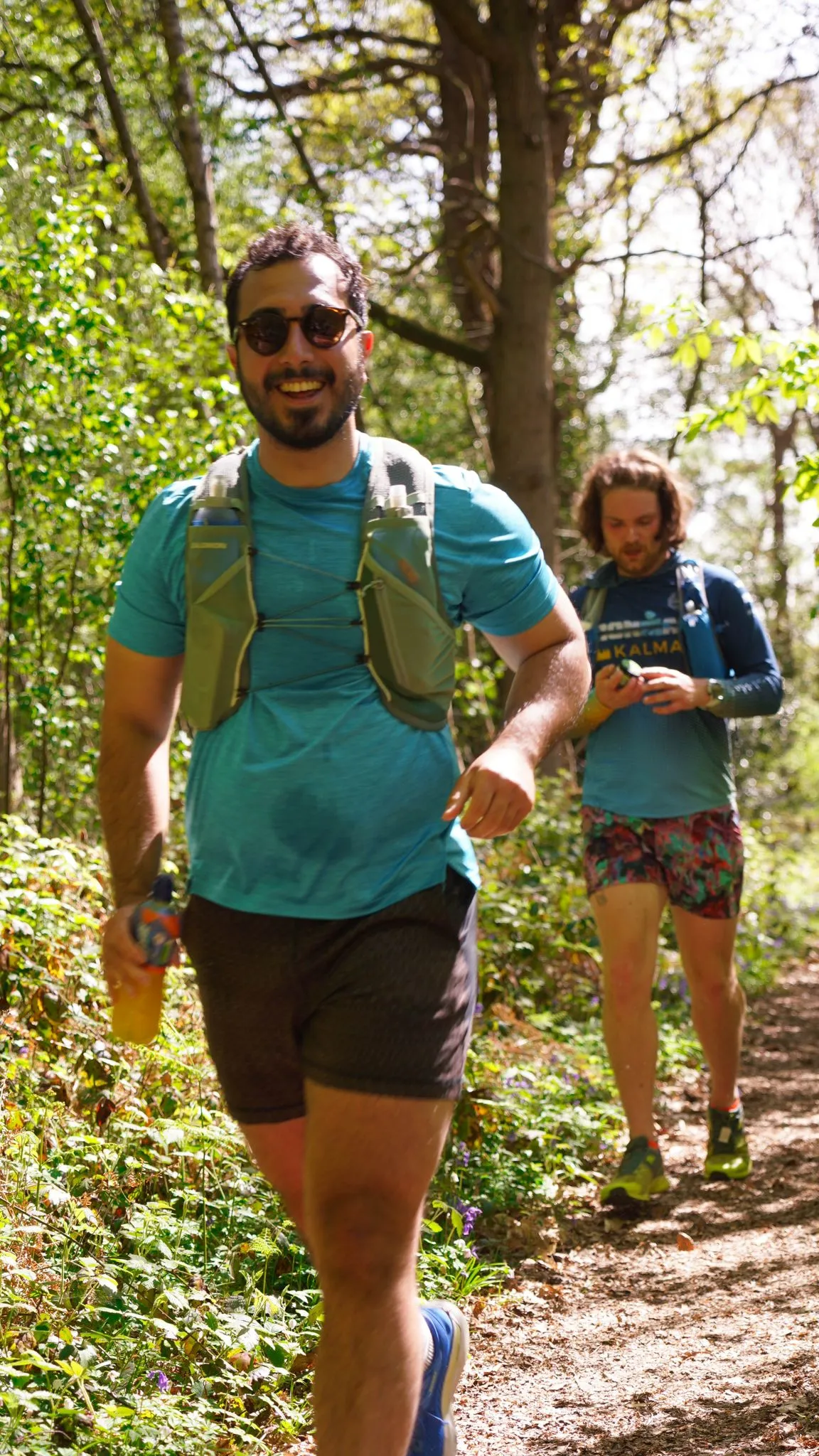 A runner on the bluebell woodland trail at Backyard Egg