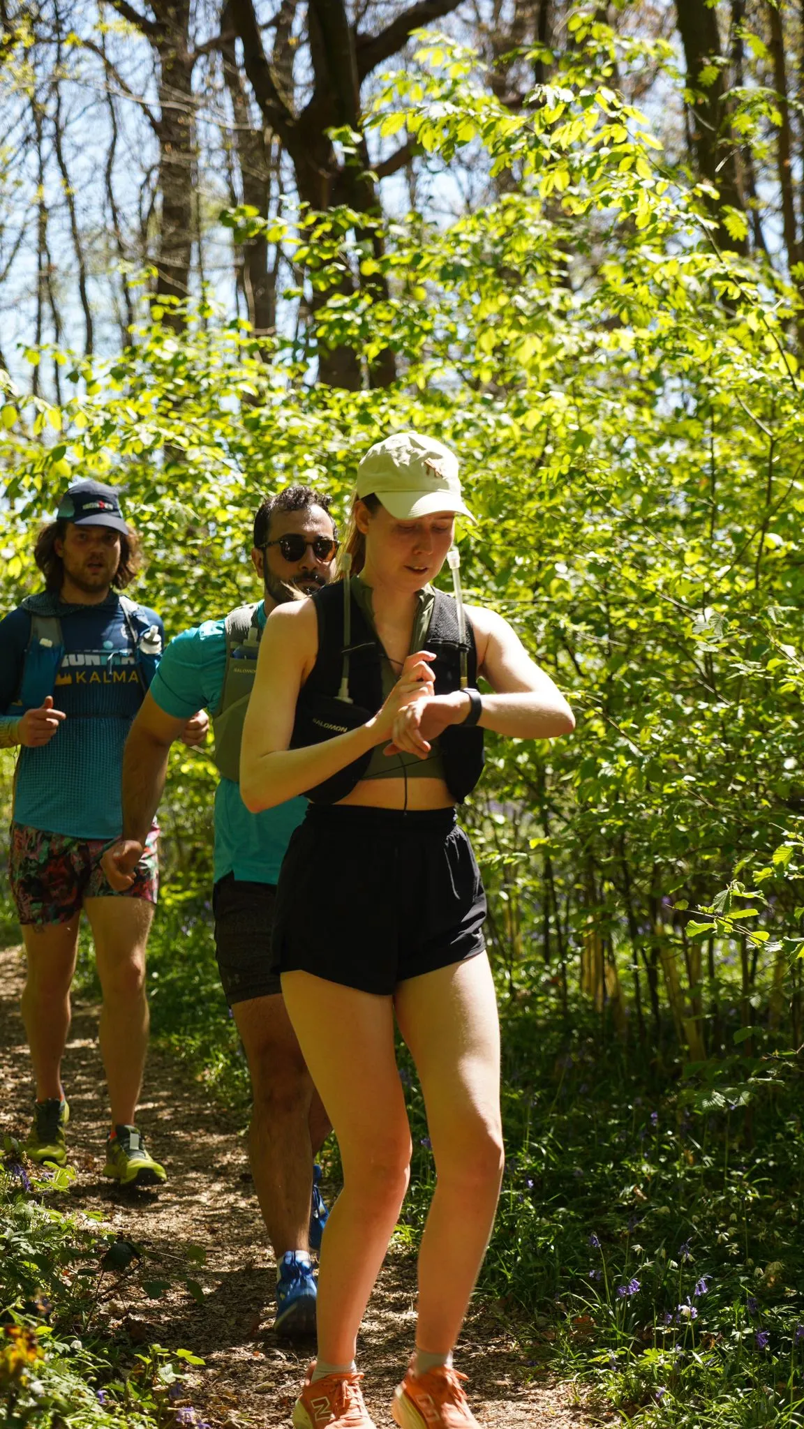 A runner on the bluebell woodland trail at Backyard Egg