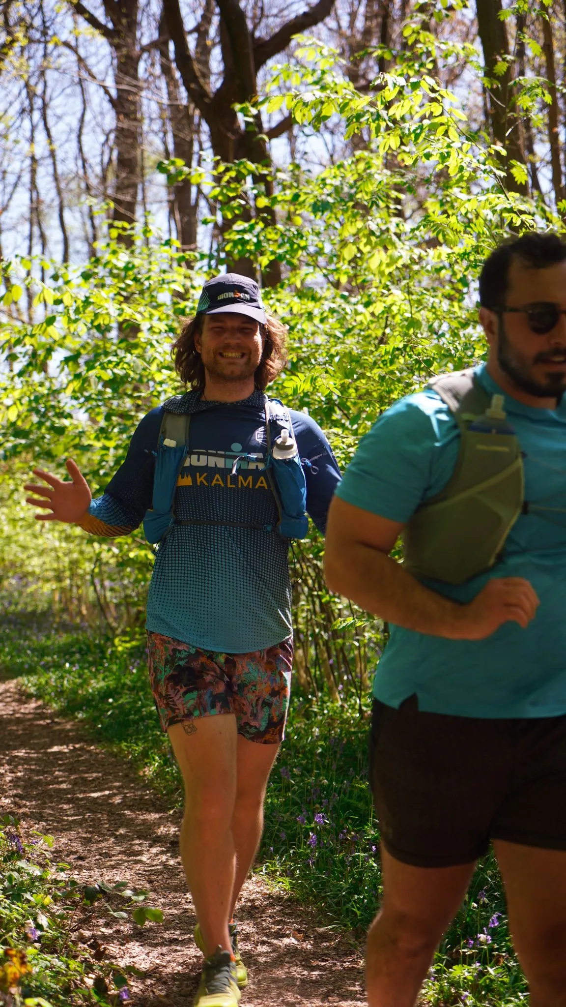 A runner on the bluebell woodland trail at Backyard Egg